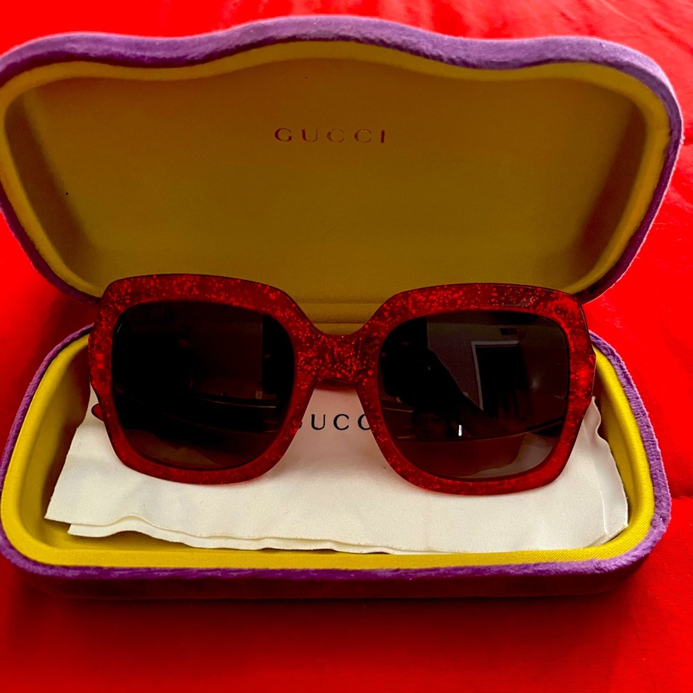 Red Gucci sunglasses